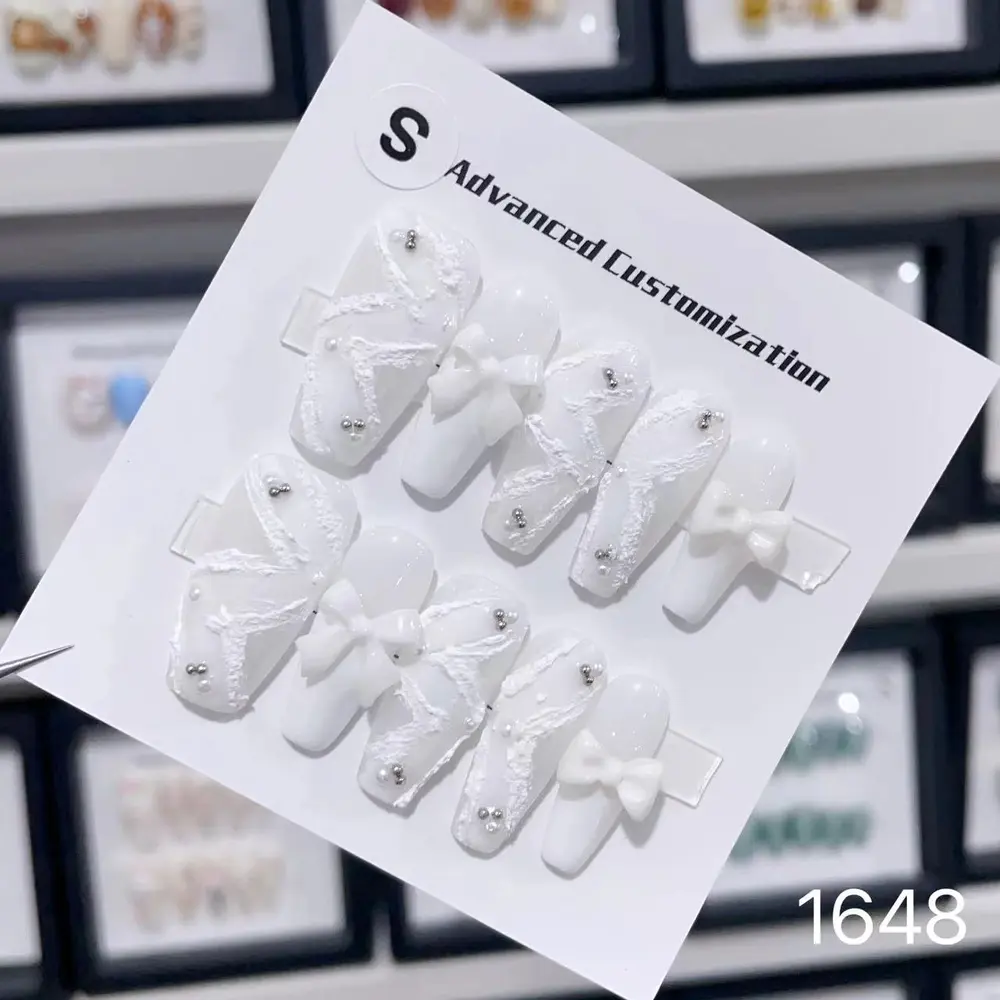 White Ribbon nail set from the customer catalog